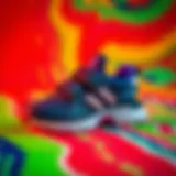 Stylish Adidas Fortarun children's shoes on a vibrant background