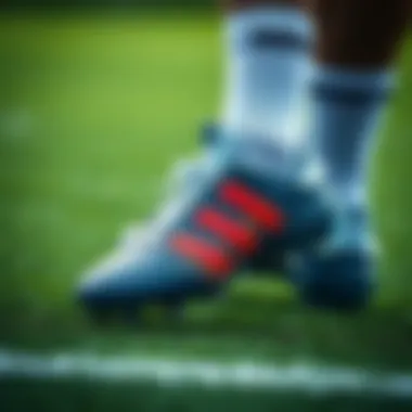 Dynamic action shot of soccer cleats on the field