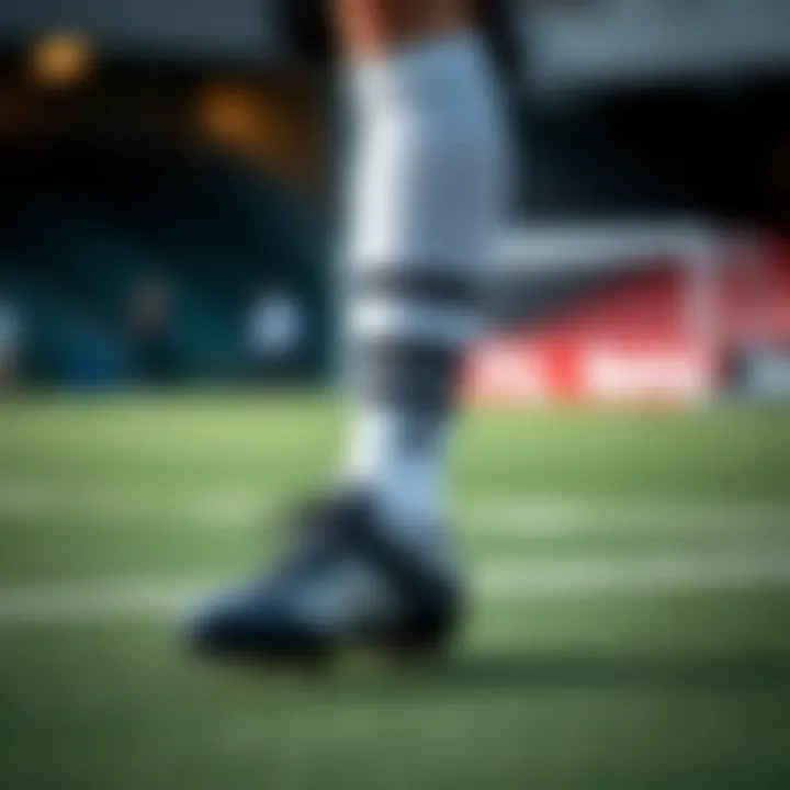 Athlete demonstrating optimal usage of black cleats on the field.