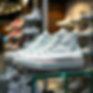 Elegant white Converse footwear on a stylish display