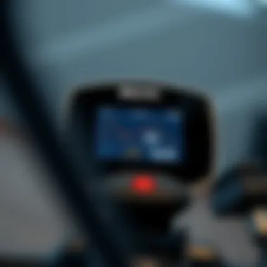 Close-up of elliptical bike console displaying workout metrics