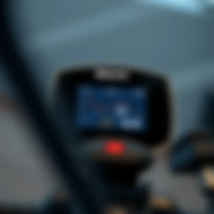 Close-up of elliptical bike console displaying workout metrics