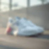 Sleek white Puma sneakers showcasing modern design elements