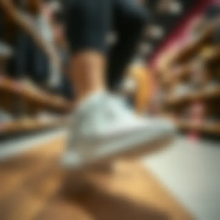 A person trying on fitness shoes in a store