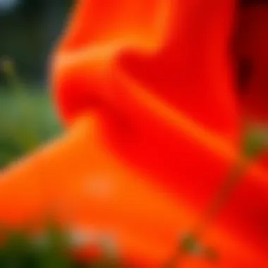 Vibrant orange tech fleece fabric showcasing its texture and quality