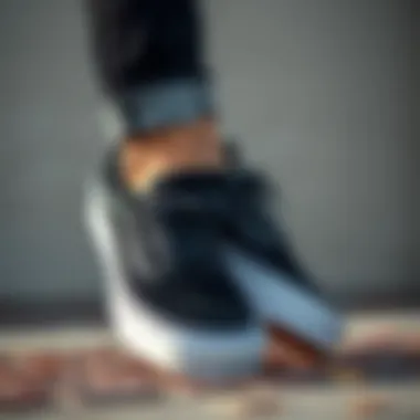 Classic black Vans shoes showcasing sleek design